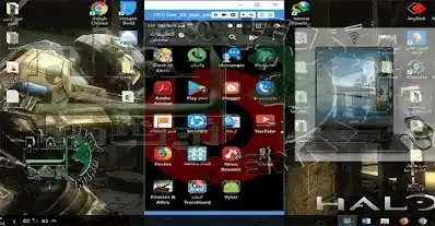 هاتف ذكي بجانب جهاز كمبيوتر يوضح عرض شاشة الهاتف على الحاسوب والتحكم به عبر USB أو Wi‑Fi ضمن شرح ربط الهاتف بالكمبيوتر